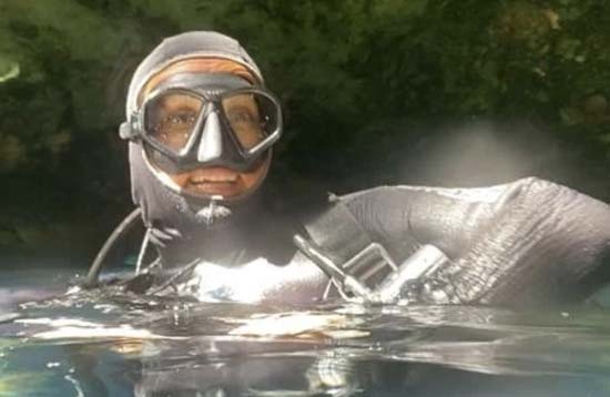 happy cenote diver